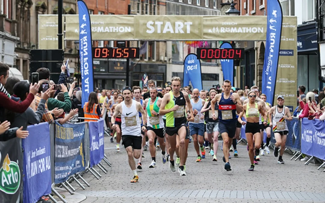 Runners cross the finish line at the Derbion Ramathon